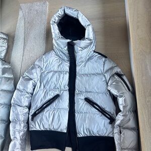 Silver Puffer Jacket with Black Accents